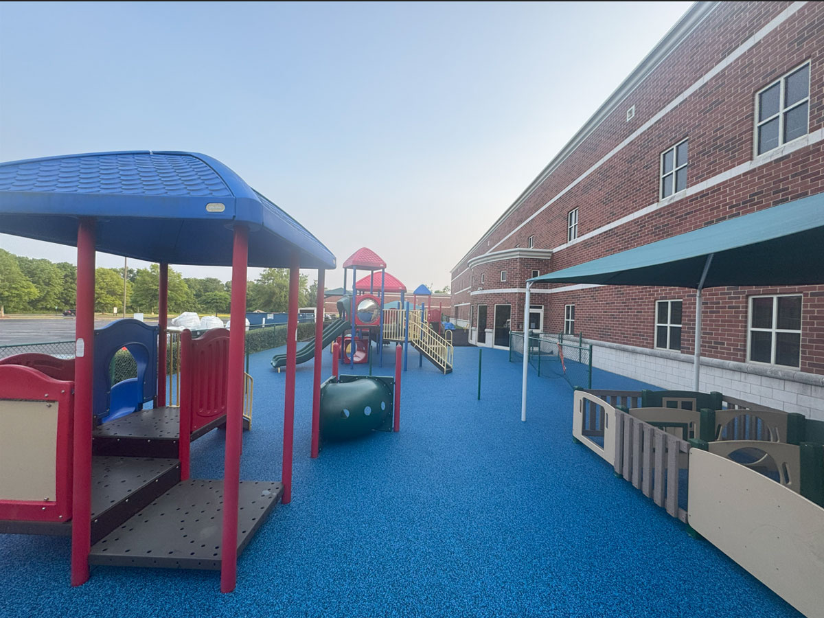 Commercial outdoor rubber surfacing project by Replay Surfacing