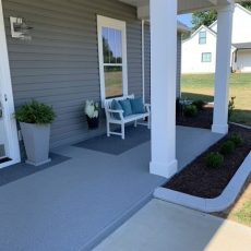 Residential rubber surfacing installation outside a house in the United States, showcasing durable, slip-resistant rubber playground surface for safe and stylish outdoor spaces. Ideal for patios, porches, or driveways, this eco-friendly residential rubber surface by Replay Rubber Surfacing enhances home safety and aesthetics across the USA.