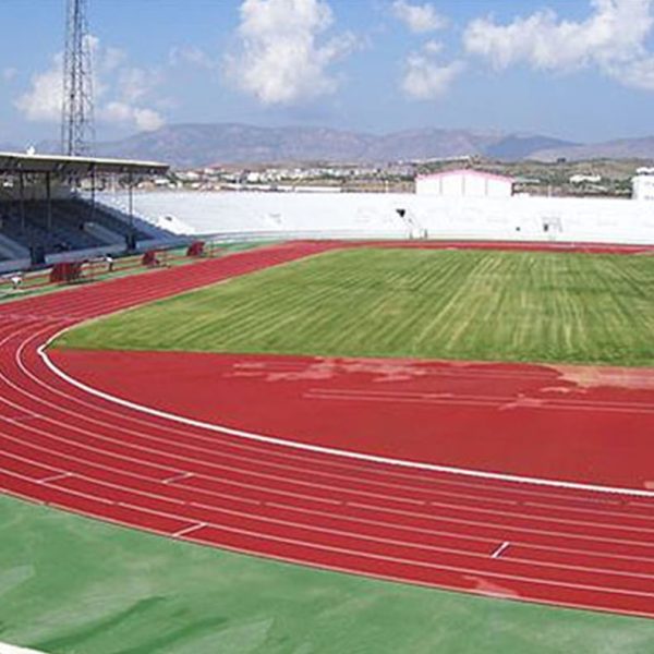 A vibrant sport running track showcasing custom sport surfacing solutions with safeplay sports and safety surfaces, designed for optimal performance and durability. This outdoor sports surface installation in the United States of America highlights premium sports surfacing and sport court surfaces.