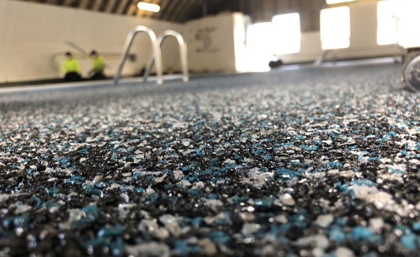 Outdoor rubber surfacing installed at Sherflek residence by Replay Surfacing for safety and style